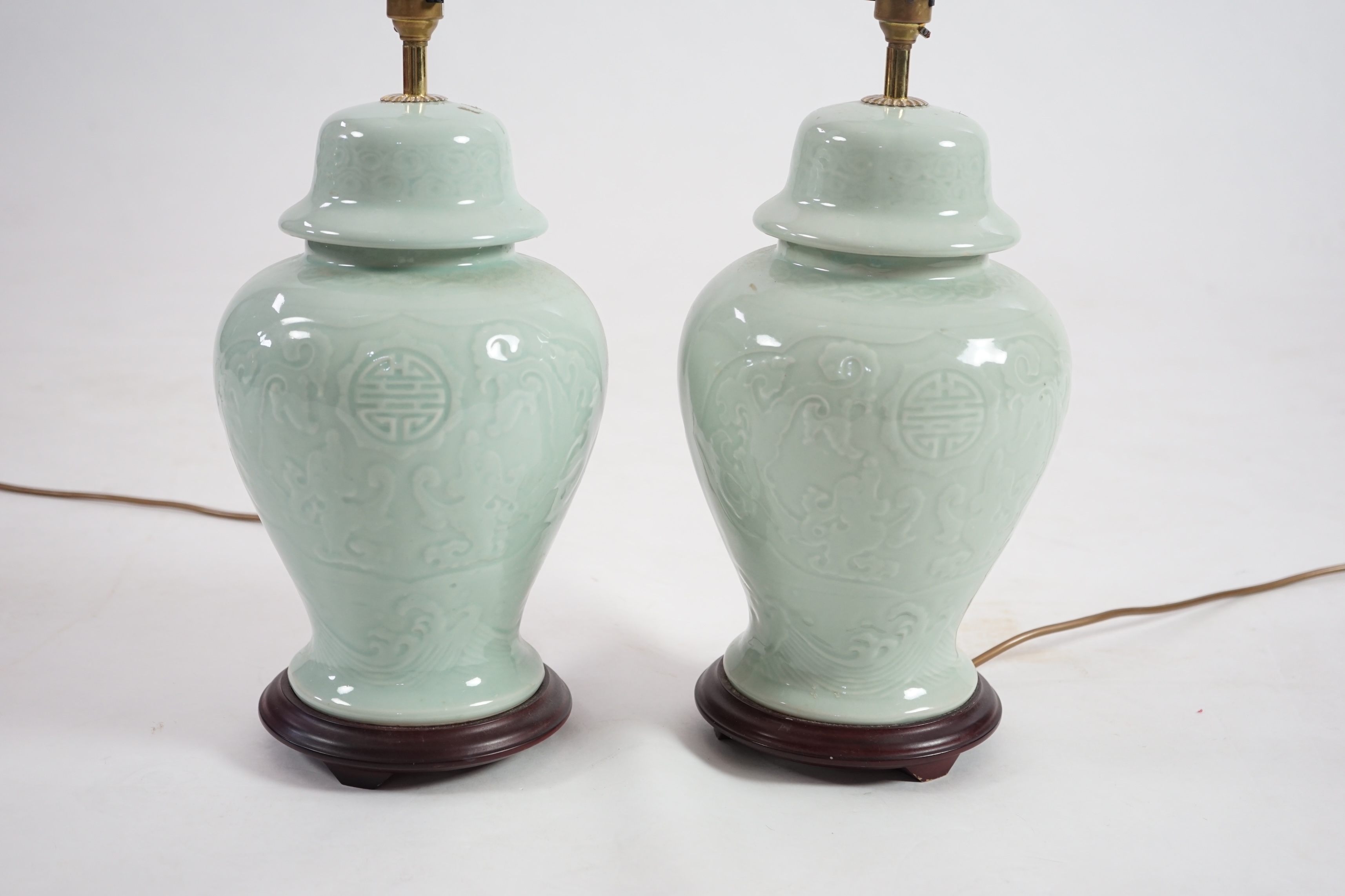 A pair of modern Chinese celadon glazed table lamps